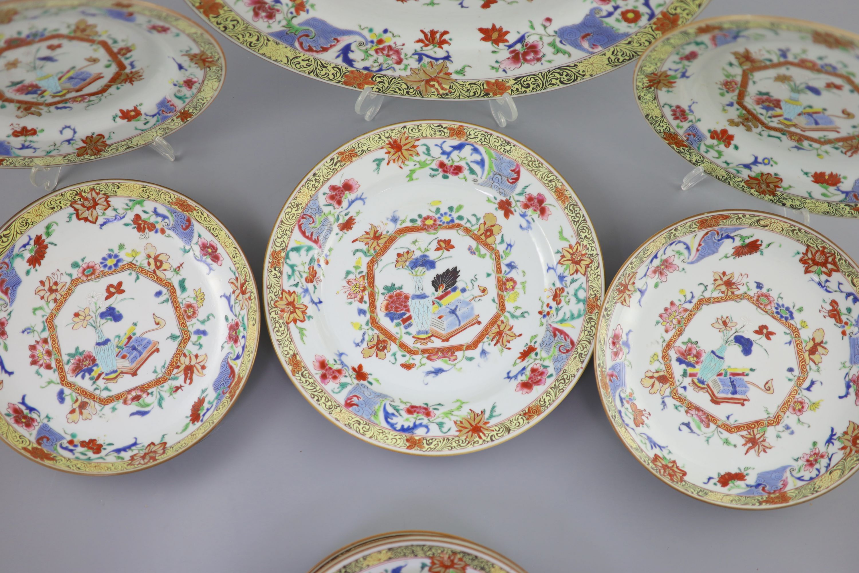 A suite of Qianlong famille rose porcelain: large dish and ten smaller dishes